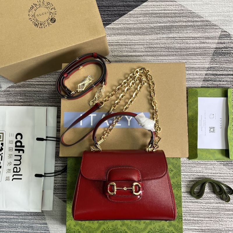 G*u*i top handle bags